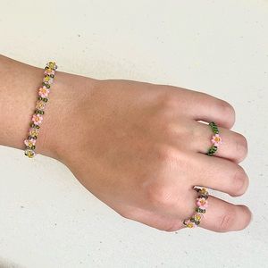 “Garden” flower bead bracelet and two rings